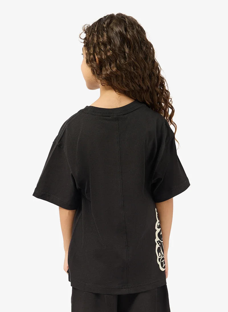 بوما تيشيرت برسومات شبابي مريح بتصميم التسعينات